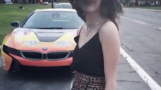 In a skirt and a BMW