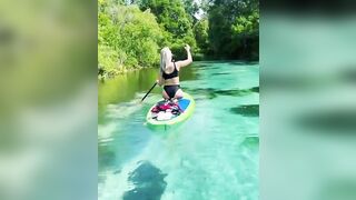 More of Liv having fun paddle boarding