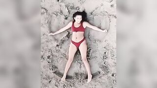 Isabela Merced: Making sand angels #3