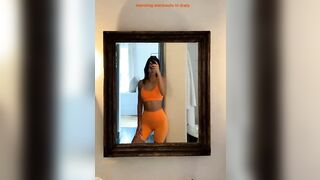 In orange workout clothes