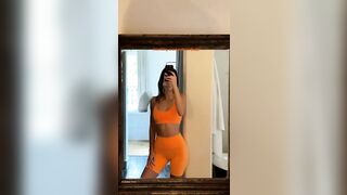 Kendall Jenner: In orange workout clothes #2